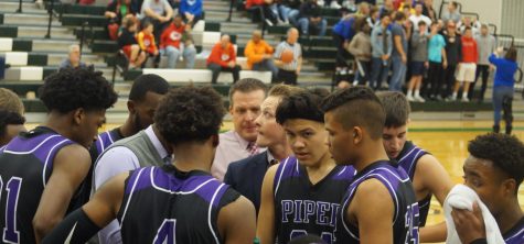 The Pirates gather in a huddle late in the 3rd quarter. The Pirates would go on to beat Gardner for the second straight year. 