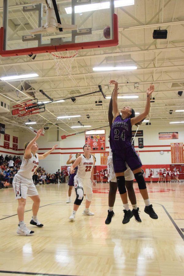 Senior LaKya Leslie gets a rebound a puts a shot back up. 