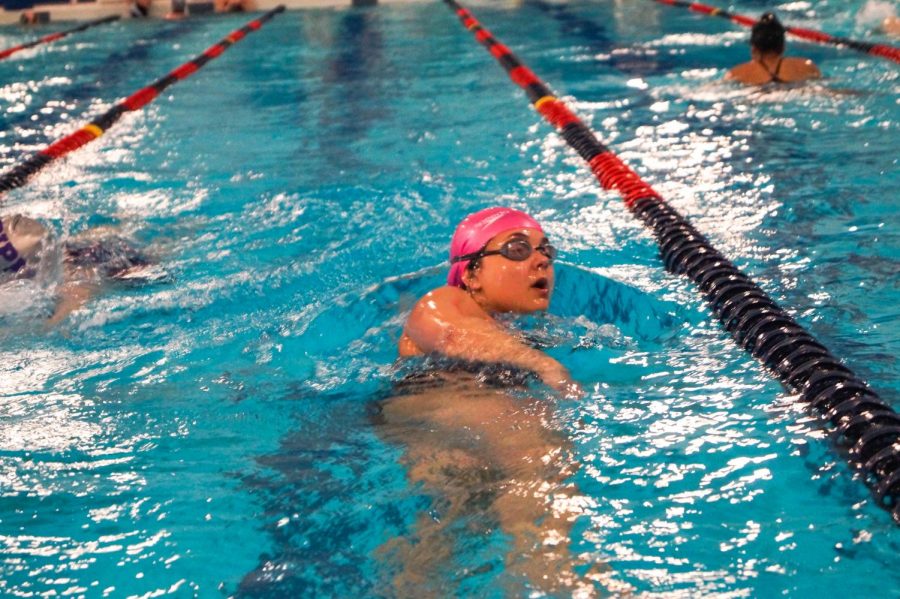 Senior Savannah Vazquez swims at the Lansing varsity meet April 1. 