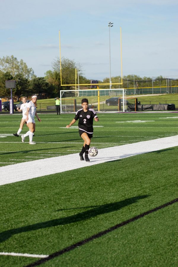 Senior Brianna Andrade advances towards the goal after winning the ball back from Spring Hill. 