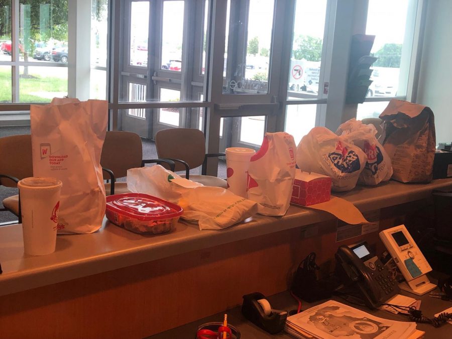 Multiple Doordash and other meal deliveries sit waiting for students to pick them up first block Monday, Sept. 9. On average secretary Sarah Barnes reported five to twenty deliveries per day.