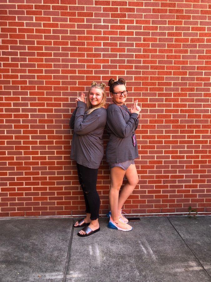 Freshmen Chloe Jochen and Reese Rottinghause wear gray for Galaxy Wars Day.