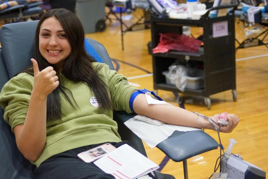 Junior, Jeweliet Nigh, donates blood on Nov. 7. Many students were unable to donate blood due to restrictions. 