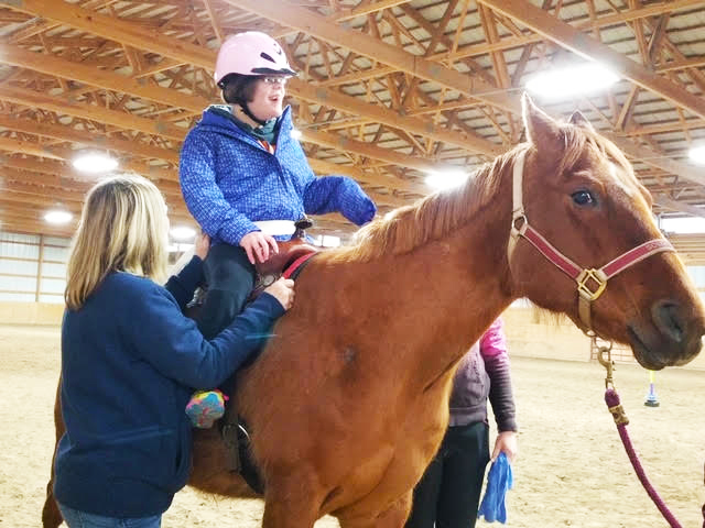 Horse SouixZQ provides support to student Savannah Adams during her lesson. Photo courtesy Mary Sharp
