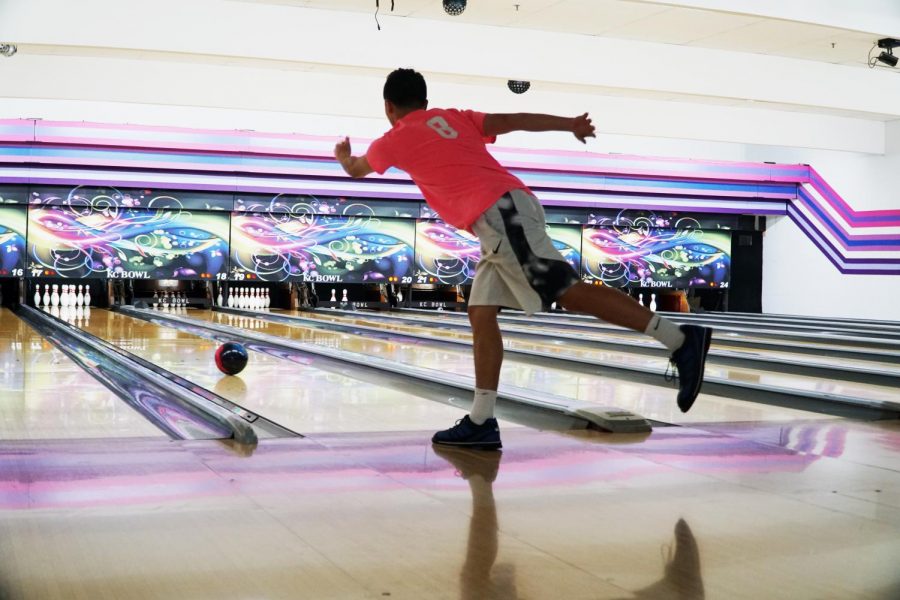 Junior Kyron Fergus aims for a strike at practice.