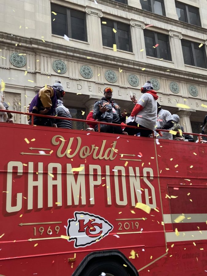Chiefs+players+go+through+the+parade+along+Grand+Street+on+Feb.+5th.+The+Parade+ended+at+Union+Station+where+the+players+were+apart+of+a+celebration+rally.
