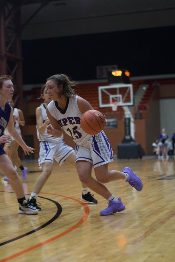 Senior Grace Banes drops 20 points against Baldwin in the first round of State. "It felt really good to come out in the first game of state my senior year shooting the ball well, but I couldn't do it without the team and their ability to give me open looks," Banes said. 