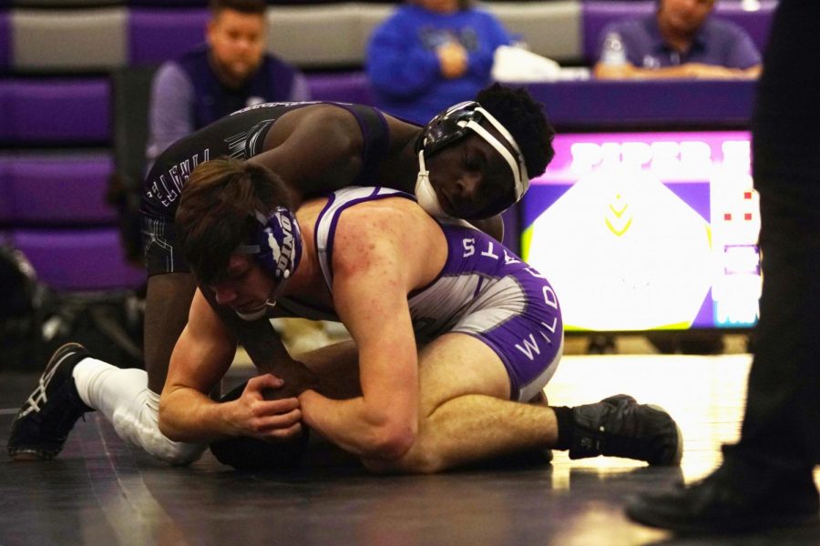 Junior Anthony Fergus is on top of his Louisburg opponent on January 20. Ferguson finished the season 40-1 as the 160 lb state champion. 