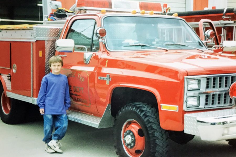 Reitemeier at 6 years old stands in front of a fire truck at Piper Prairie Days in 1992.