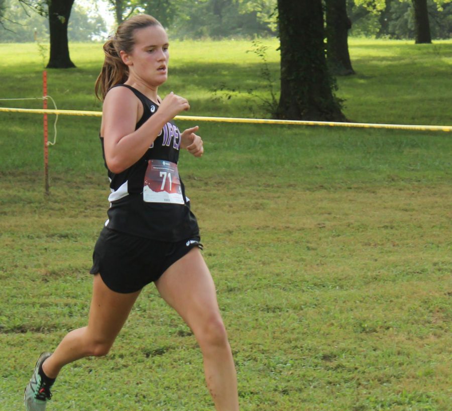Grace Hanson runs in first meet at Wyandotte County Park. photo by Jodi Soptic