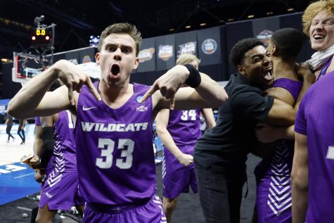 Paul Hiepler from 14 seed Abeline Christian celebrates after taking down 3 seeded Texas.