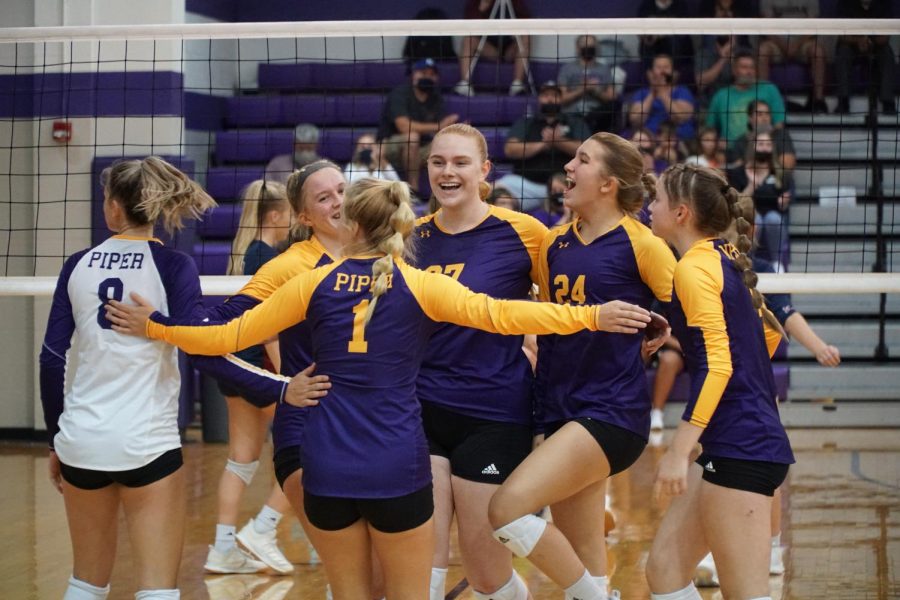 Lady Pirates come together after scoring against St. James. The Pirates lost in the first round of substate to the Thunder.