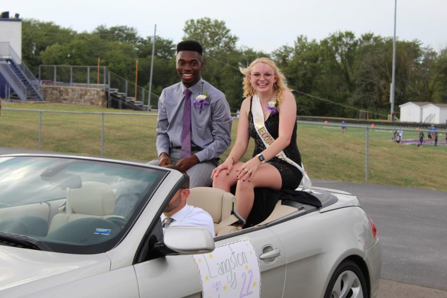 Candidates Langston Basset and Olivia Blankenship finishes the parade route with full smiles.