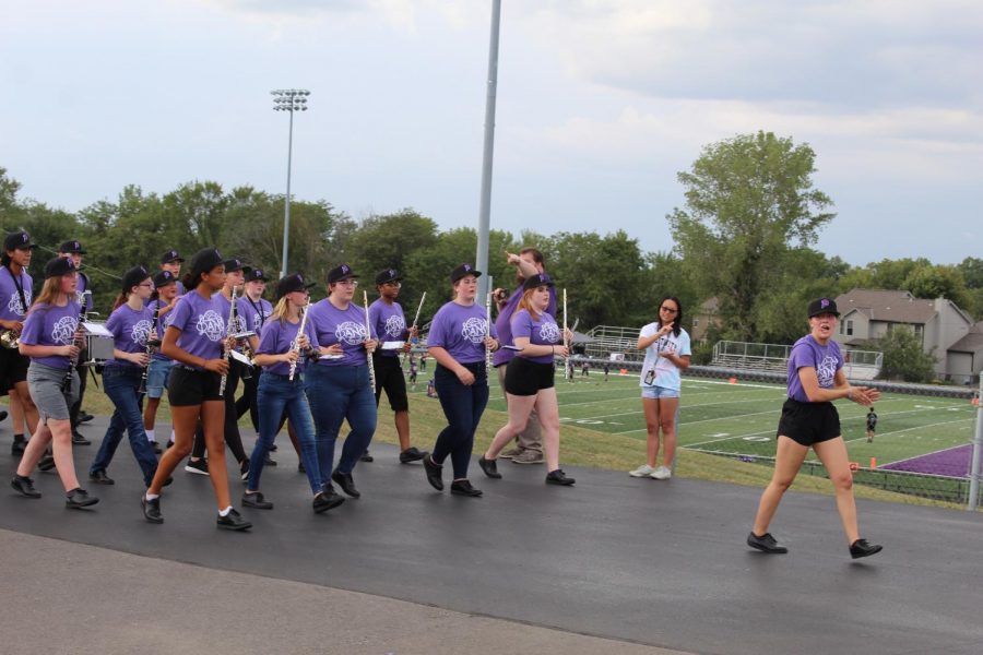 The Pride of Piper Marching Band march down the road ending the parade.