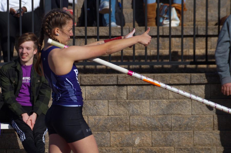 Senior Kaitlin Lindstrom at the Lawrence Free State track meet placing first in pole vault.