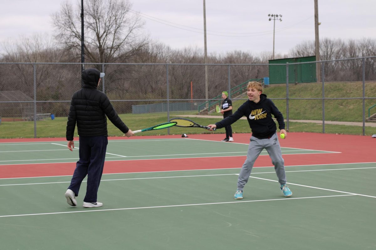 Sophomores Johnny Vogel and Baird Greenamyer play doubles